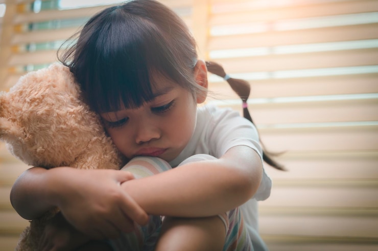 A Child's Solitude With A Teddy Bear